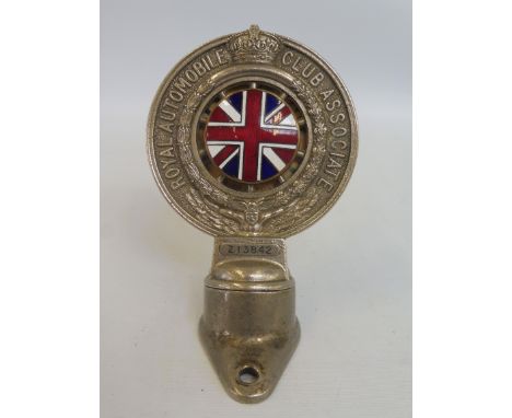 A small Royal Automobile Club Associate car badge with excellent enamel union jack centre, unusual dumb iron fitting no. 2138