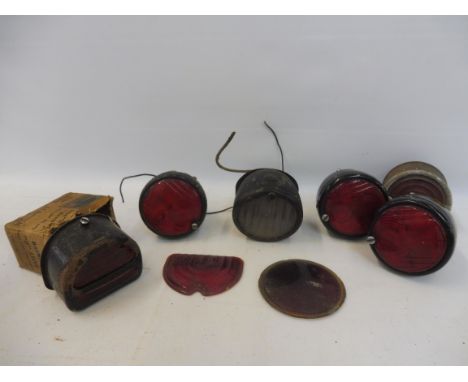 A boxed Brenner 'D' stop and tail lamp in original box, one other, four pork pie stop lamps etc. 