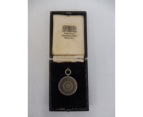 A Royal Automobile Club silver plated medallion awarded to E.J. Baker, holder of the RAC Driving Certificate for 5 years cont