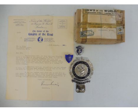 An Order of the Knights of the Road 'presented by the News of The World' car badge, chrome plated and enamel, stamped 1025, i