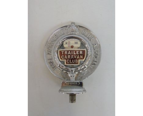 A Royal Automobile Club Associate car badge with Trailer Caravan Club enamel centre, no. F40402.