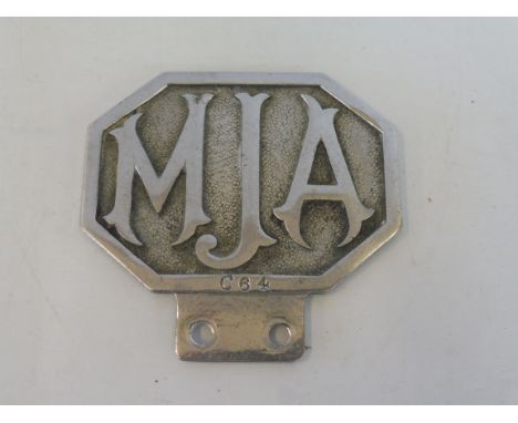 A Jersey Motor Association Commercial 2 badge, late 1930s-1948, chrome plated brass and enamel.