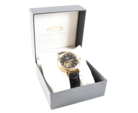 A boxed Rotary Les Originals automatic part skeleton watch. The watch in original case with original receipt and instructions