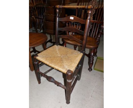 A 19th century Macclesfield ladder back dining chair with wicker seat and club legs