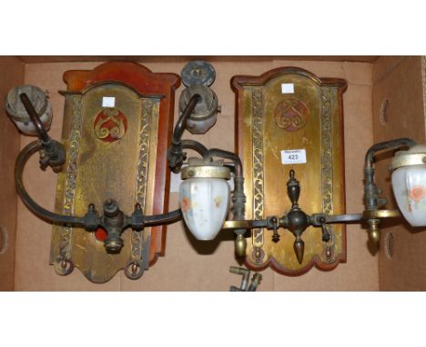 Three Edwardian 2 branch brass gas light fittings on wall plaques, with boxes of mantels