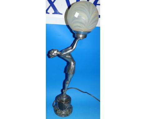 An Art Deco style silvered finish figural table lamp on polished stone base