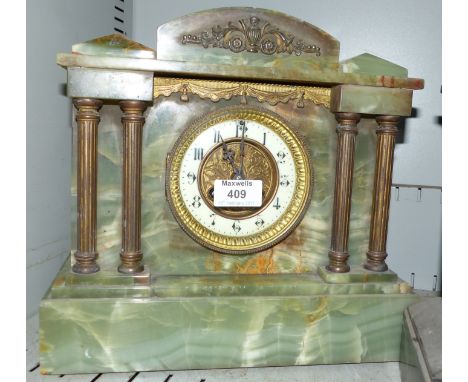 A 19th century architectural mantel clock with gilt metal pillar and mounts, cream and gilt dial, and French striking drum mo