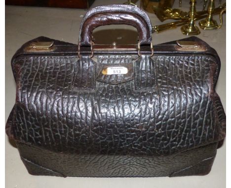 A vintage walrus hide case by McBrine, 18"