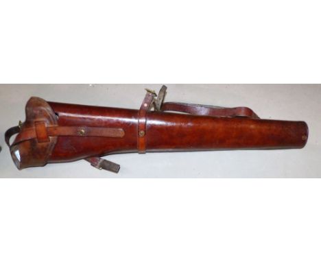 A WWI vintage leather Hotchkiss machine gun bucket with straps for cavalry saddle mounting, 38"