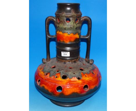 A large 1970's lava ware lamp base in bright orange glaze, with double handles, 19"