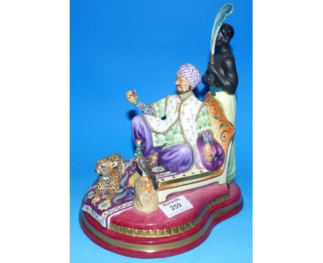 A ceramic handpainted figure group: "The Sultan", 1 of 100 by number 29 Peggy Davies, 10½"