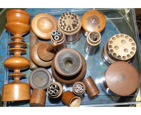 A selection of turned wooden items, including cases for small tools