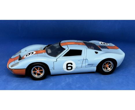 Ford GT-40 Le Mans 69 1:18 scale model car. In original box. UNSIGNED. Good condition. All autographs come with a Certificate