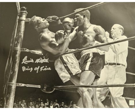 Emile Griffith signed 18x14 inch approx black and white photo inscribed Emile Griffith Ring of Fire. Good condition. All auto