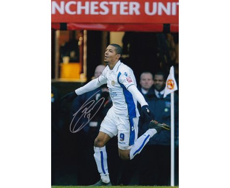 Autographed Jermaine Beckford 12 X 8 Photo : Col, Depicting Leeds United's Jermaine Beckford Running Away In Celebration Afte