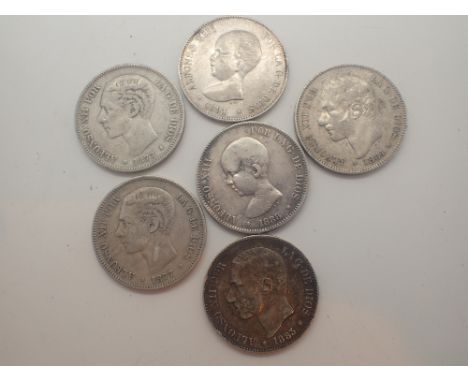 Six silver five peseta coins 1877 x 2, 1883, 1884, 1888 and 1891