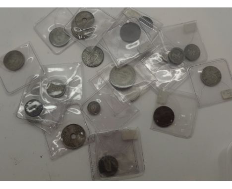 Box of mixed world coins including some silver examples 