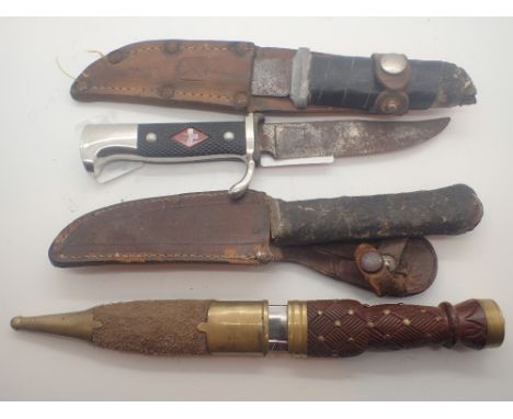 Four mixed knives including vintage examples CONDITION REPORT: POSTAGE: There are International restrictions on the shipment 