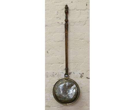 A Victorian copper and brass bed warming pan.