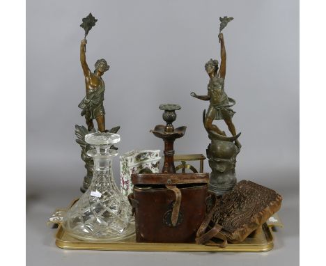 A tray lot of collectables, spelter figurines, ships decanter, cased Hensoldt 6 x 30 binoculars, mantel clocks, carved printi