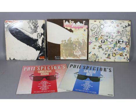 Led Zeppelin I, 2 and 3 L.P records and Paul Spectors greatest hits and Christmas album. Condition Report. To be used as a gu