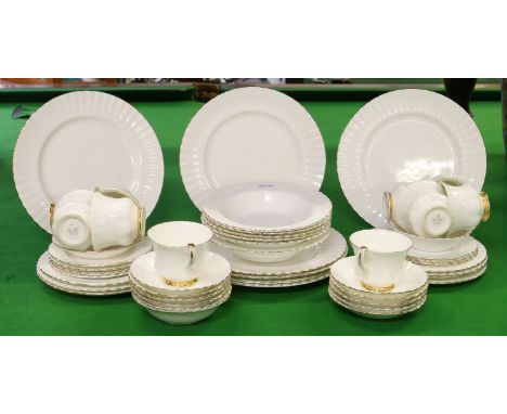 A Royal Albert part tea/dinner service with gilt decoration (approximately fifty pieces).