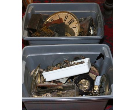 Two boxes of various clock parts for spares and repairs.