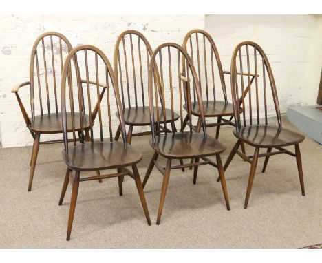 A set of six Ercol spindleback dining chairs including two carver armchairs.