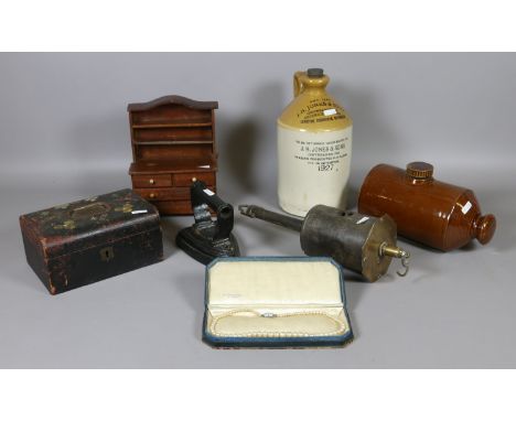 A lot of collectables to include an advertising stoneware flagon, stoneware foot warmer, vintage iron, miniature wooden cabin