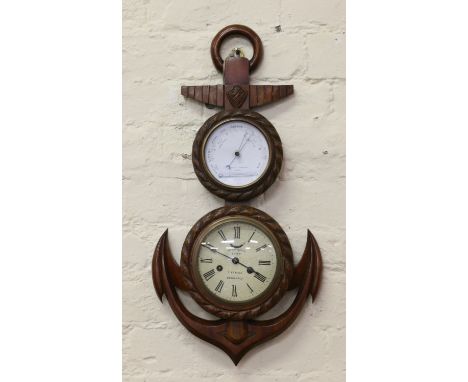 An oak framed clock barometer formed as a ships anchor.