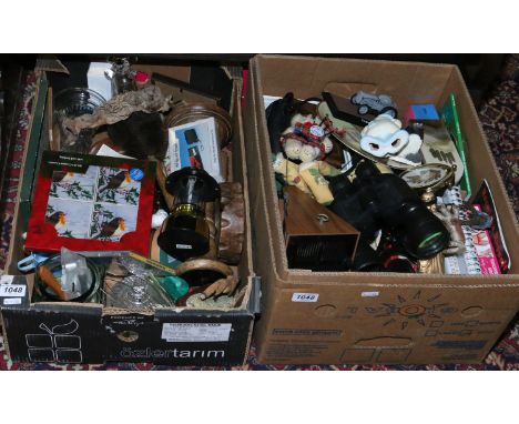 Two boxes of miscellaneous to include binoculars and a metronome.