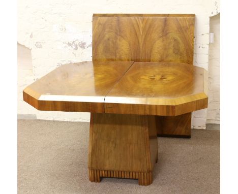 An Art Deco walnut extending centre pedestal dining table and four chairs in the manner of Epstein Brothers. 212cm long fully