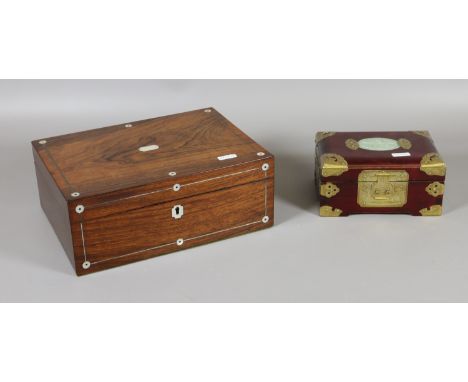 A Victorian inlaid rosewood box, later fitted, along with an Oriental hardwood casket with brass mounts and jade tablet.