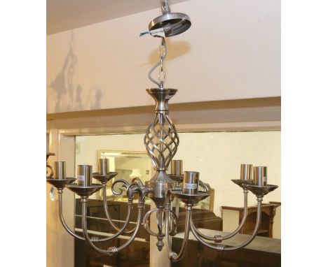 A seven branch brushed steel hanging ceiling light.