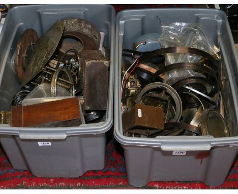Two boxes of various clock parts for spares and repairs.