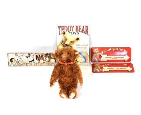 Steiff - Raffles red brown Singapore bear, 39cm high, with box and certificate, together with a group of metal signs comprisi