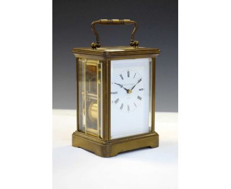 Matthew Norman, London brass cased carriage clock, having a white Roman dial with moon hands, 10cm x 13.5cm high (ex. handle)