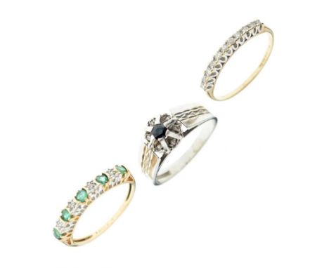 Three 9ct gold gem set dress rings, comprising a 9ct white gold sapphire cluster ring, size M, and two half eternity rings, 6