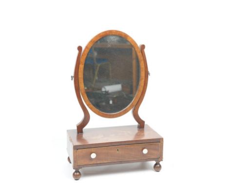 A late 19th Century inlaid mahogany dressing table mirror with an oval plate
Lyre shape supports the plinth base with a friez