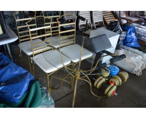 A metal based glass top table; together with four matching ladder back chairs