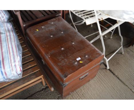 A large tin trunk and contents of various pictures, games, red lacquered jewellery box etc.