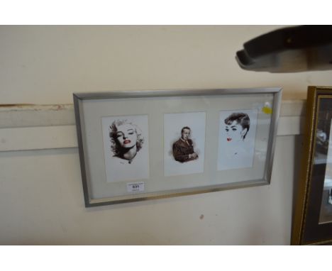 A set of three portrait prints framed as one