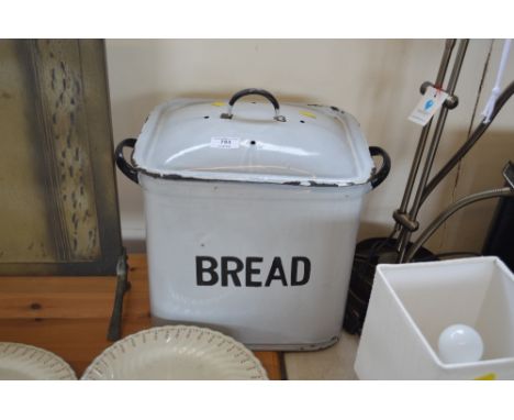 An enamel bread bin; together with a fire screen