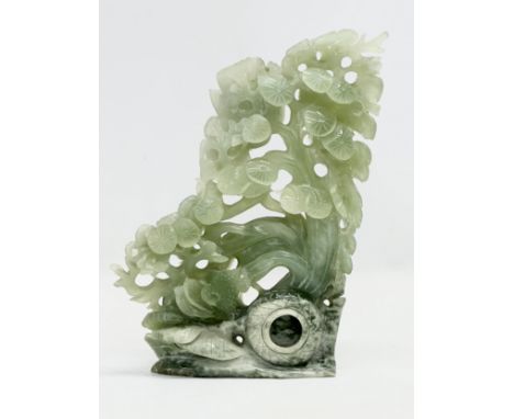 A large Chinese carved jade. 20x29cm