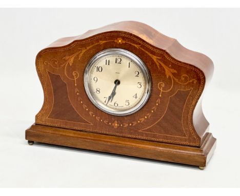An Edwardian inlaid mahogany mantle clock. New works. 28x8x19cm