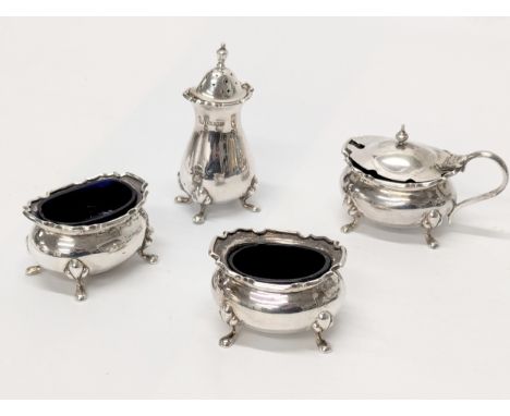 A 4 piece Early 20th Century silver condiment set by possibly Robert Scott. Glasgow, 1922. 191.5g without liners.