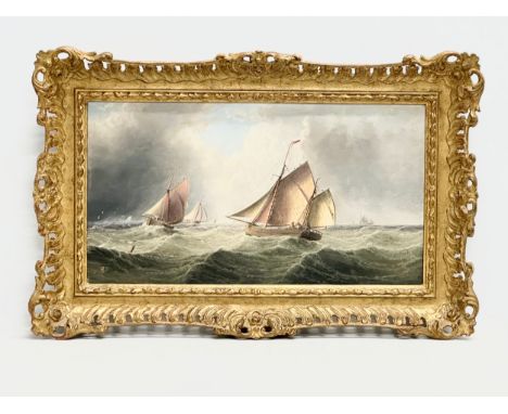Edward Redmore (1860-1941) An oil on canvas. Fishing Boats in the Channel. In a Victorian gilt frame. 54x28cm. Frame 72x46cm