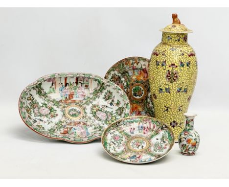 A collection of 19th and Early 20th Century Chinese pottery. 3 Canton Rose Medallion plates 27x21x4cm. A Chinese Famille Juan