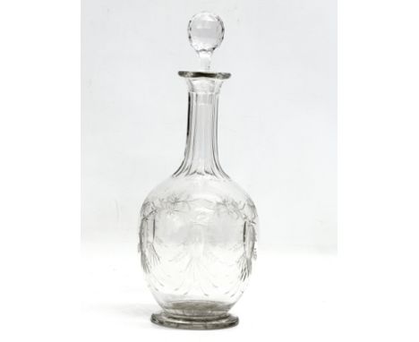A 19th Century Victorian etched and engraved glass decanter. 31cm