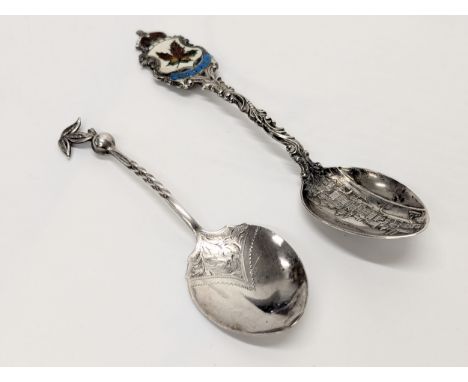 Two ornate silver spoons. Total 42g